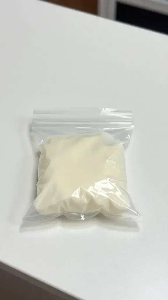 Closeup of a single labeled freezer bag with one-portion portioning on a white counter